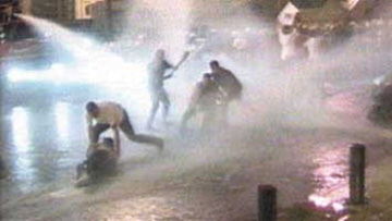 Lebanese youth demonstrating against Syrian occupation in a face-off with security forces